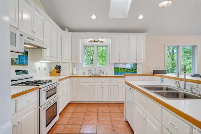 806 Cedar Key Ln, Huddleston, VA 24104 - kitchen with white appliances, tasteful backsplash, white cabinetry, light countertops, and recessed lighting