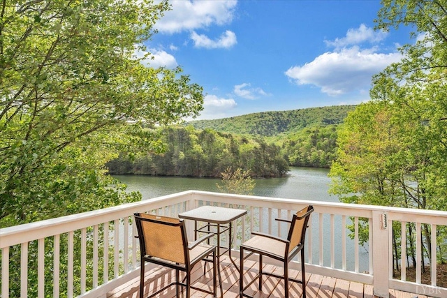 806 Cedar Key Ln, Huddleston, VA 24104 - wooden deck with a water view and a wooded view