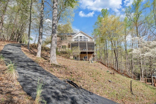 806 Cedar Key Ln, Huddleston, VA 24104 - view of front of house with stairs, a deck, and a sunroom
