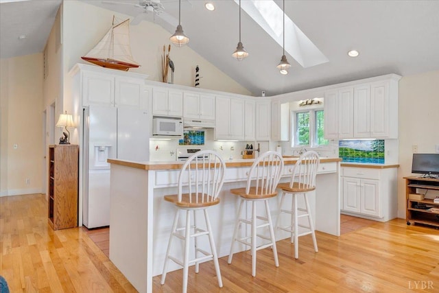 806 Cedar Key Ln, Huddleston, VA 24104 - kitchen with white appliances, white cabinets, light wood-type flooring, high vaulted ceiling, and recessed lighting