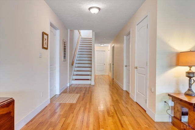 806 Cedar Key Ln, Huddleston, VA 24104 - corridor with light wood-style floors and stairway