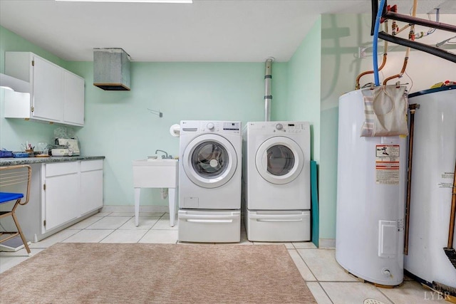 806 Cedar Key Ln, Huddleston, VA 24104 - laundry room featuring cabinet space, independent washer and dryer, light tile patterned flooring, electric water heater, and gas water heater