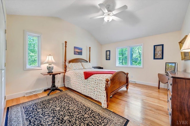 806 Cedar Key Ln, Huddleston, VA 24104 - bedroom with lofted ceiling, light wood-style flooring, and a ceiling fan