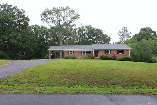 295 Charles Dr, Appomattox, VA 24522 - ranch-style home featuring driveway, brick siding, a front lawn, and an attached carport