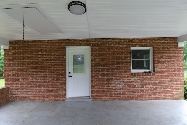 295 Charles Dr, Appomattox, VA 24522 - entrance to property featuring brick siding and a patio area