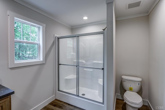 895 Union Hill Rd, Amherst, VA 24522 - bathroom featuring a shower stall, wood finished floors, crown molding, toilet, and baseboards