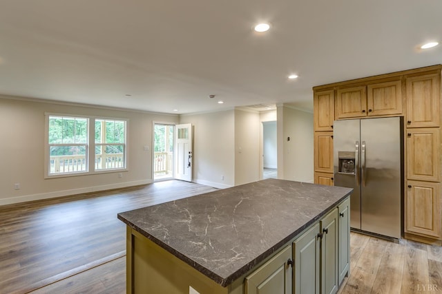 895 Union Hill Rd, Amherst, VA 24522 - kitchen featuring stainless steel fridge with ice dispenser, ornamental molding, light wood-type flooring, recessed lighting, and a kitchen island