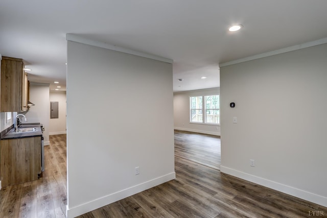 895 Union Hill Rd, Amherst, VA 24522 - corridor with crown molding, electric panel, a sink, wood finished floors, and baseboards