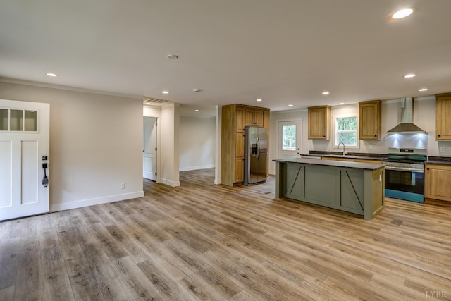895 Union Hill Rd, Amherst, VA 24522 - kitchen with stainless steel appliances, wall chimney exhaust hood, ornamental molding, dark countertops, and a kitchen island