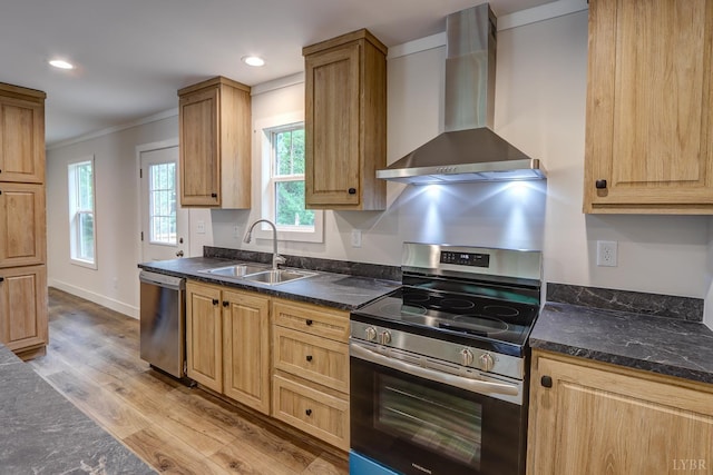895 Union Hill Rd, Amherst, VA 24522 - kitchen with appliances with stainless steel finishes, wall chimney range hood, a sink, ornamental molding, and dark countertops