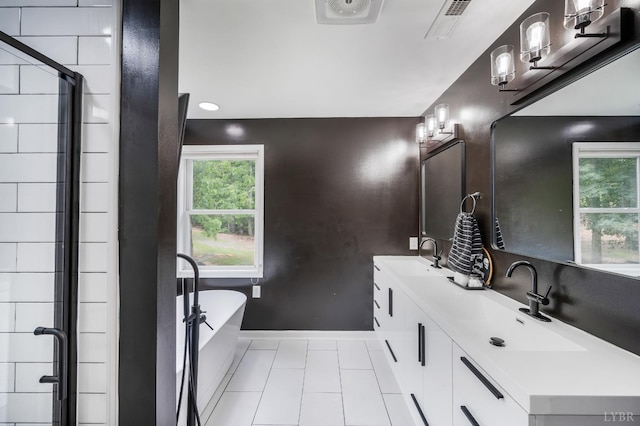 135 Warner Rd, Lynchburg, VA 24504 - full bathroom with baseboards, tile patterned floors, a freestanding bath, a stall shower, and double vanity