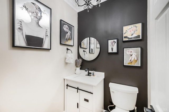 135 Warner Rd, Lynchburg, VA 24504 - bathroom with toilet, vanity, a chandelier, and ornamental molding