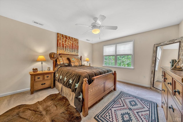 1309 W Pine Ridge Rd, Huddleston, VA 24014 - bedroom featuring light carpet, baseboards, and a ceiling fan