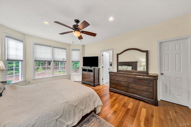 1309 W Pine Ridge Rd, Huddleston, VA 24014 - bedroom with light wood finished floors, recessed lighting, and a ceiling fan