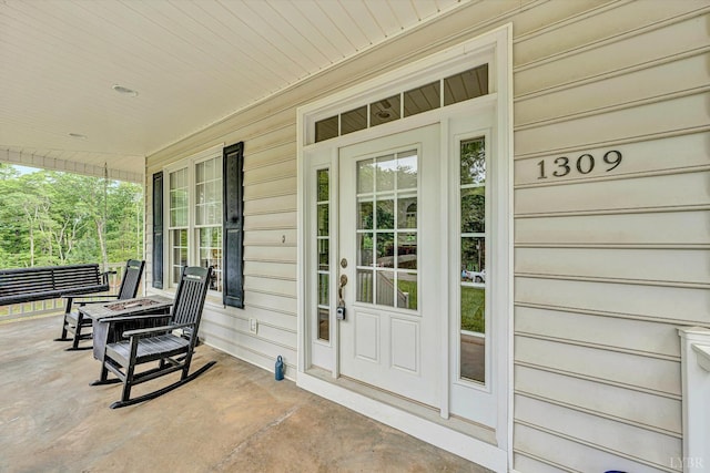 1309 W Pine Ridge Rd, Huddleston, VA 24014 - view of exterior entry with a porch