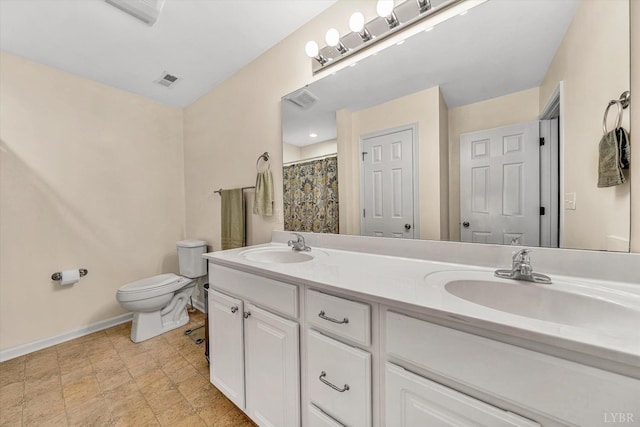 1309 W Pine Ridge Rd, Huddleston, VA 24014 - full bath with baseboards, toilet, and double vanity