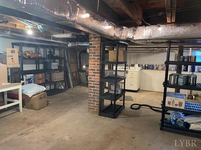 202 Leftwich St, Gretna, VA 24557 - unfinished below grade area featuring washer / dryer