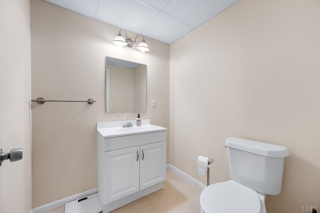 3374 Goode Station Rd, Goode, VA 24556 - half bathroom with baseboards, vanity, a drop ceiling, and toilet