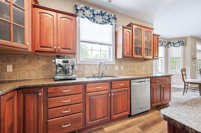 3374 Goode Station Rd, Goode, VA 24556 - kitchen with dishwasher, a sink, backsplash, light wood-style flooring, and stone countertops