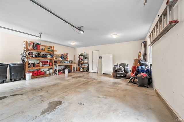 3374 Goode Station Rd, Goode, VA 24556 - garage featuring freestanding refrigerator