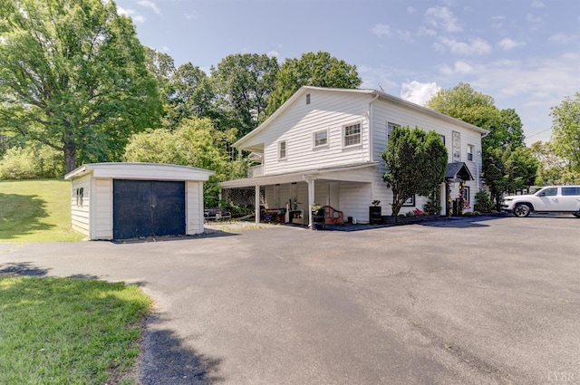 2770 W Lynchburg Salem Tpke, Bedford, VA 24523 - view of property exterior with an outbuilding and a lawn