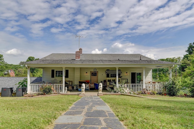 2770 W Lynchburg Salem Tpke, Bedford, VA 24523 - back of property with covered porch, a yard, and a chimney
