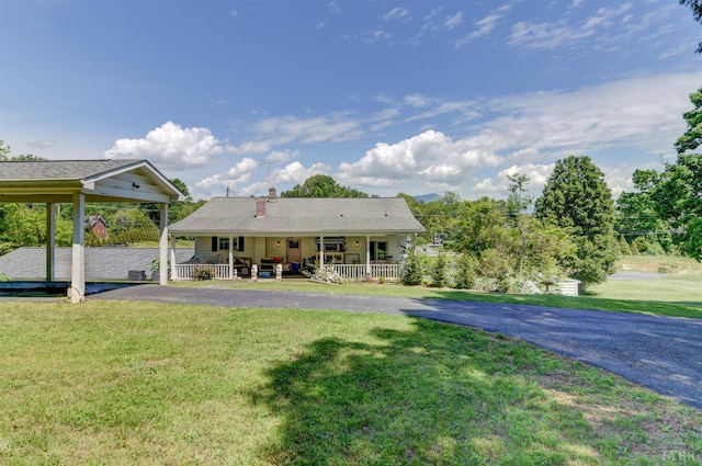 2770 W Lynchburg Salem Tpke, Bedford, VA 24523 - back of property featuring covered porch, a yard, a chimney, and driveway