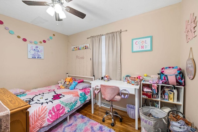 702 11th St, Altavista, VA 24517 - bedroom featuring hardwood / wood-style flooring, ceiling fan, and baseboards
