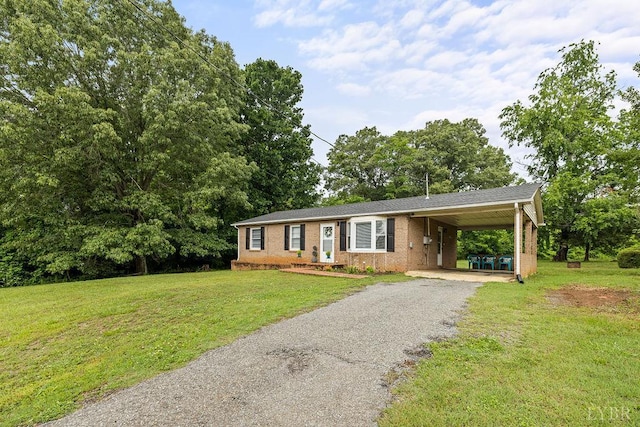 702 11th St, Altavista, VA 24517 - ranch-style home with driveway, brick siding, a front yard, and an attached carport