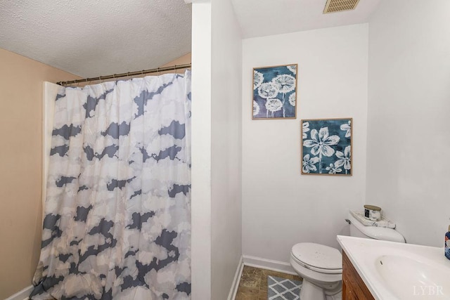 702 11th St, Altavista, VA 24517 - bathroom featuring toilet, vanity, baseboards, a shower with shower curtain, and a textured ceiling