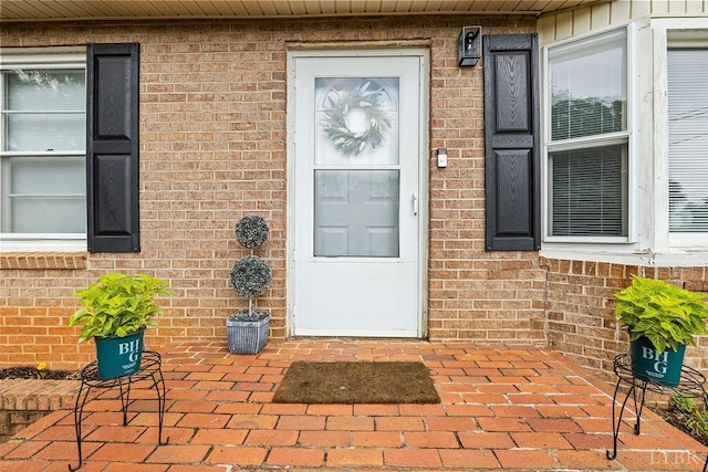 702 11th St, Altavista, VA 24517 - view of exterior entry featuring brick siding