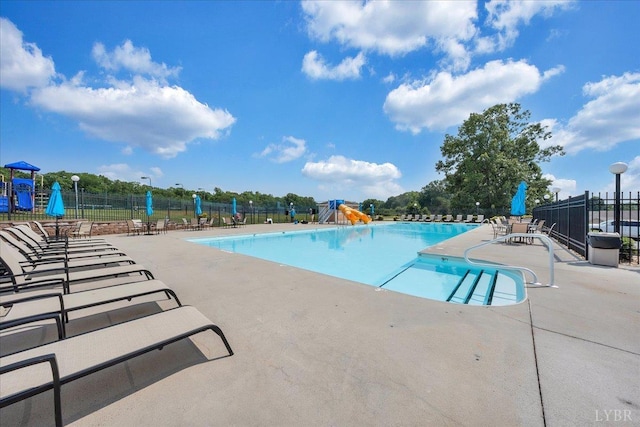 4 Gof View Ct, Huddleston, VA 24104 - community pool with fence, a patio area, and a water slide