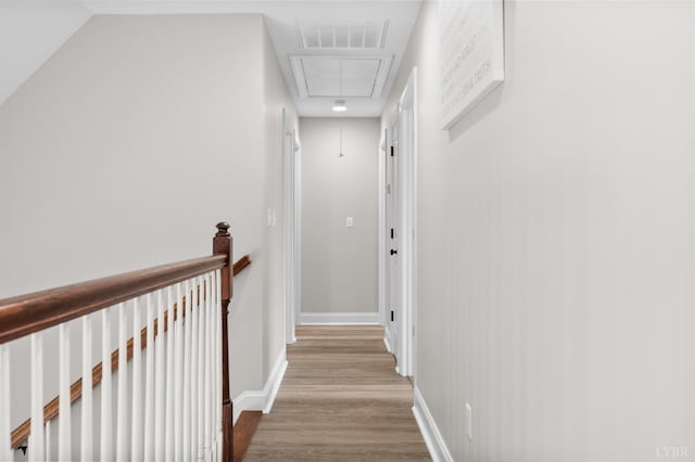 314 Cooper Way, Evington, VA 24550 - hallway featuring attic access, wood finished floors, an upstairs landing, and baseboards