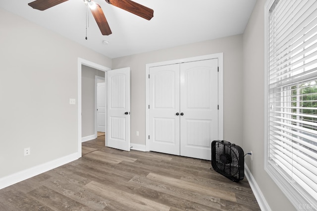 314 Cooper Way, Evington, VA 24550 - unfurnished bedroom with wood finished floors, baseboards, and a closet