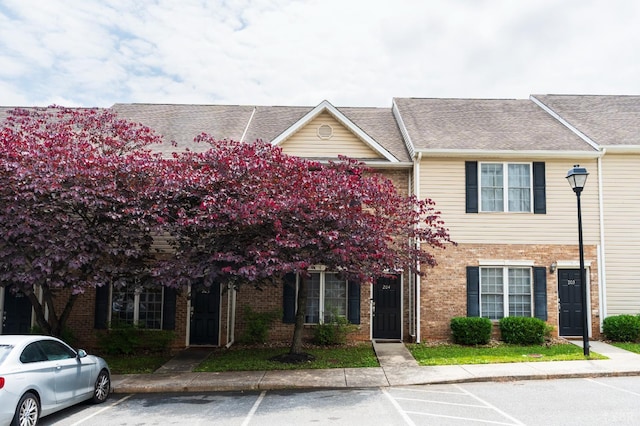 1600 Wards Ferry Rd Unit 204, Lynchburg, VA 24502 - view of property featuring uncovered parking and brick siding