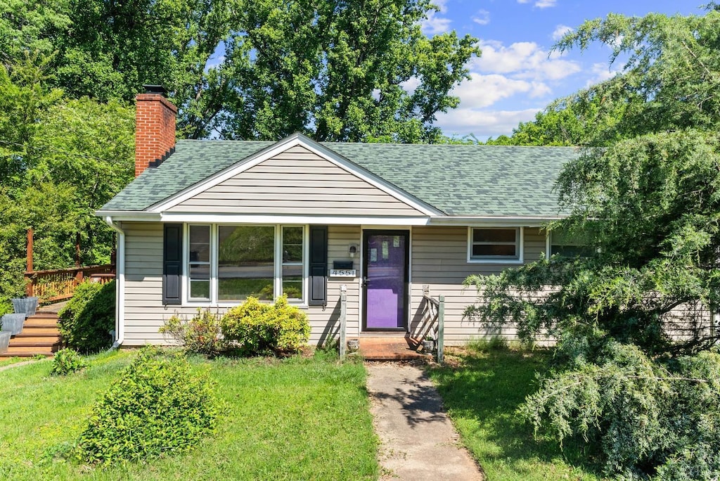 4551 Greenwood Dr, Lynchburg, VA 24502 - bungalow featuring a shingled roof, a chimney, and a front yard