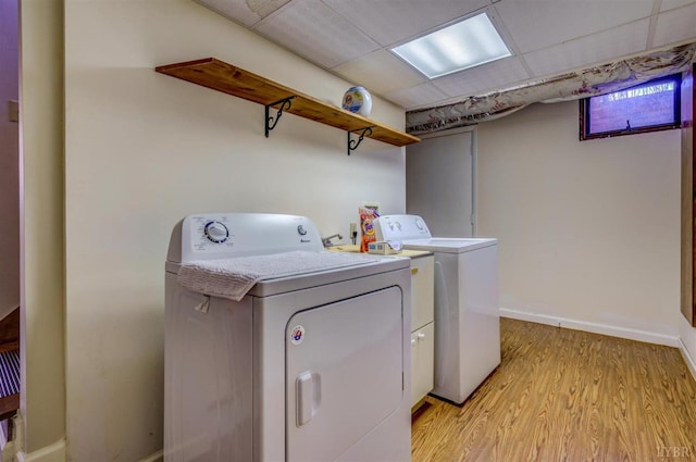 450 Holyfield Ln, Moneta, VA 24121 - washroom with washer and clothes dryer and light wood finished floors