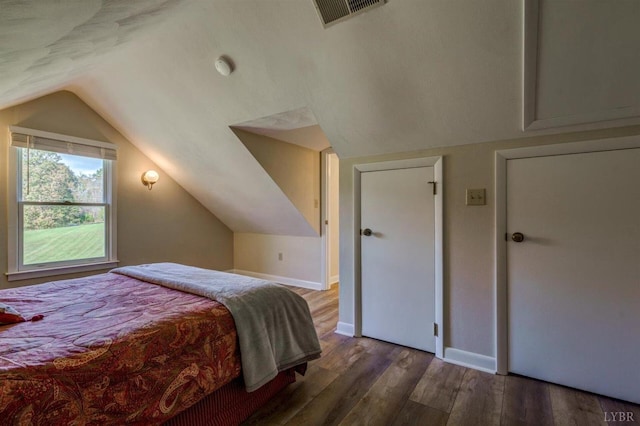 450 Holyfield Ln, Moneta, VA 24121 - bedroom featuring wood finished floors and lofted ceiling