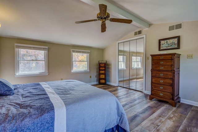 450 Holyfield Ln, Moneta, VA 24121 - bedroom with wood finished floors, multiple windows, a closet, and a ceiling fan
