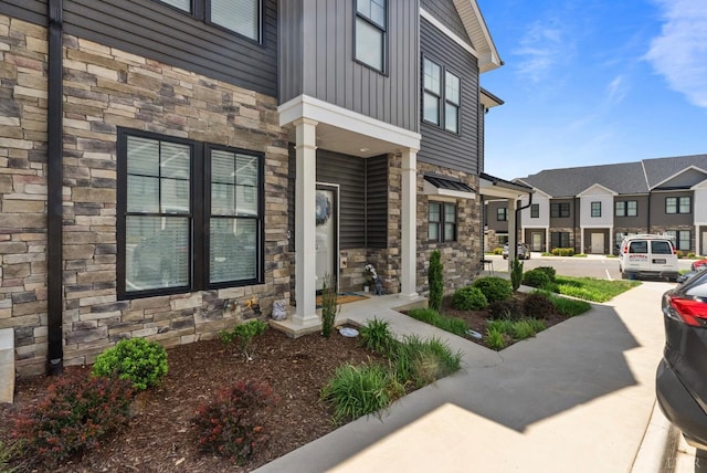 19 Cuddington Ln, Lynchburg, VA 24501 - property entrance featuring stone siding, board and batten siding, and a residential view