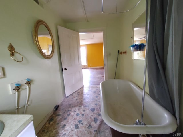 1503 Jackson St, Lynchburg, VA 24504 - full bathroom with a freestanding bath, stone finish floors, and vanity