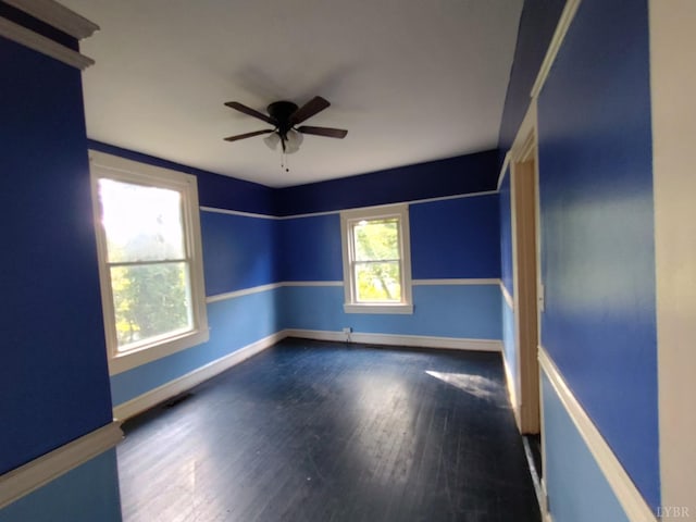 1503 Jackson St, Lynchburg, VA 24504 - empty room with ceiling fan, wood finished floors, and baseboards