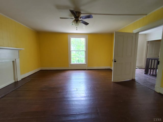 1503 Jackson St, Lynchburg, VA 24504 - unfurnished living room featuring ceiling fan, wood finished floors, baseboards, and ornamental molding