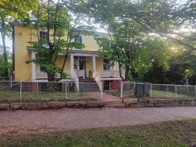 1503 Jackson St, Lynchburg, VA 24504 - view of front of property with a porch, stairway, a fenced front yard, and a gate