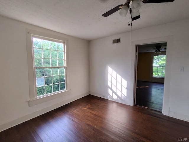 1503 Jackson St, Lynchburg, VA 24504 - unfurnished room featuring dark wood-style floors, ceiling fan, and baseboards