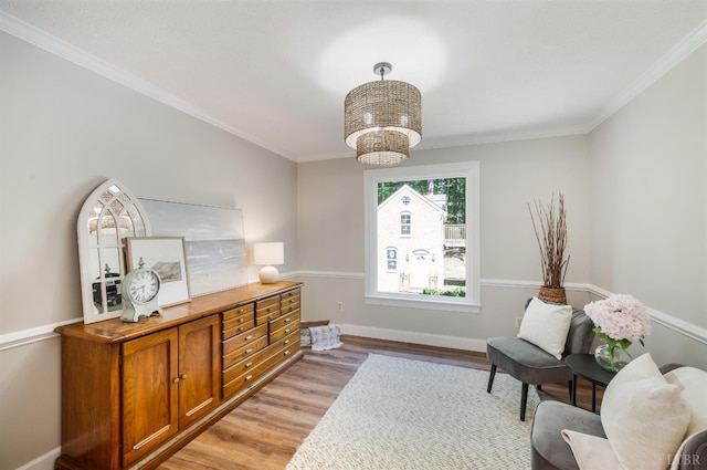 134 Woodmont Ln, Forest, VA 24551 - living area featuring light wood-type flooring, crown molding, a chandelier, and baseboards