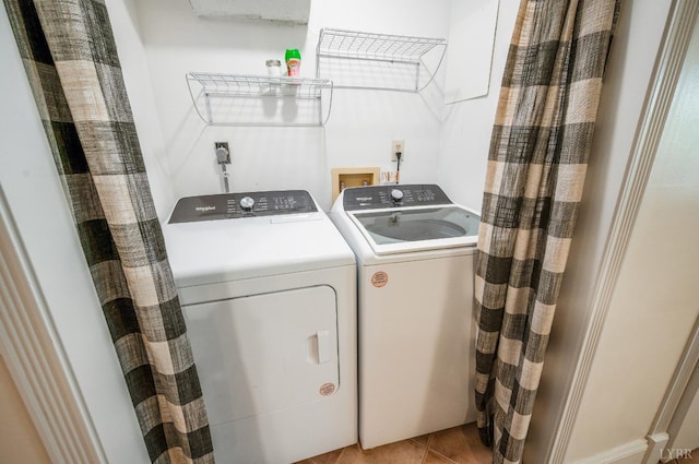 134 Woodmont Ln, Forest, VA 24551 - laundry room featuring washing machine and dryer and light tile patterned floors