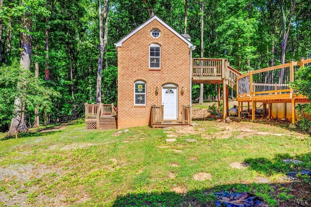 134 Woodmont Ln, Forest, VA 24551 - view of front of property with a deck, a front lawn, brick siding, and stairway