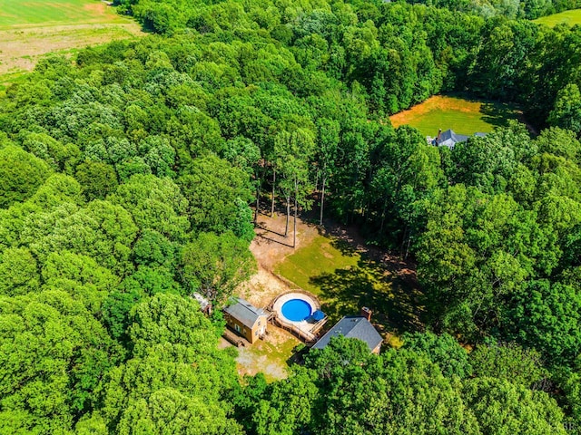 134 Woodmont Ln, Forest, VA 24551 - aerial view of a heavily wooded area and a pool area