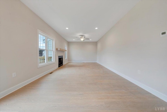 20 Elk Creel Rd, Forest, VA 24551 - unfurnished living room with ceiling fan, light wood finished floors, a fireplace, baseboards, and recessed lighting